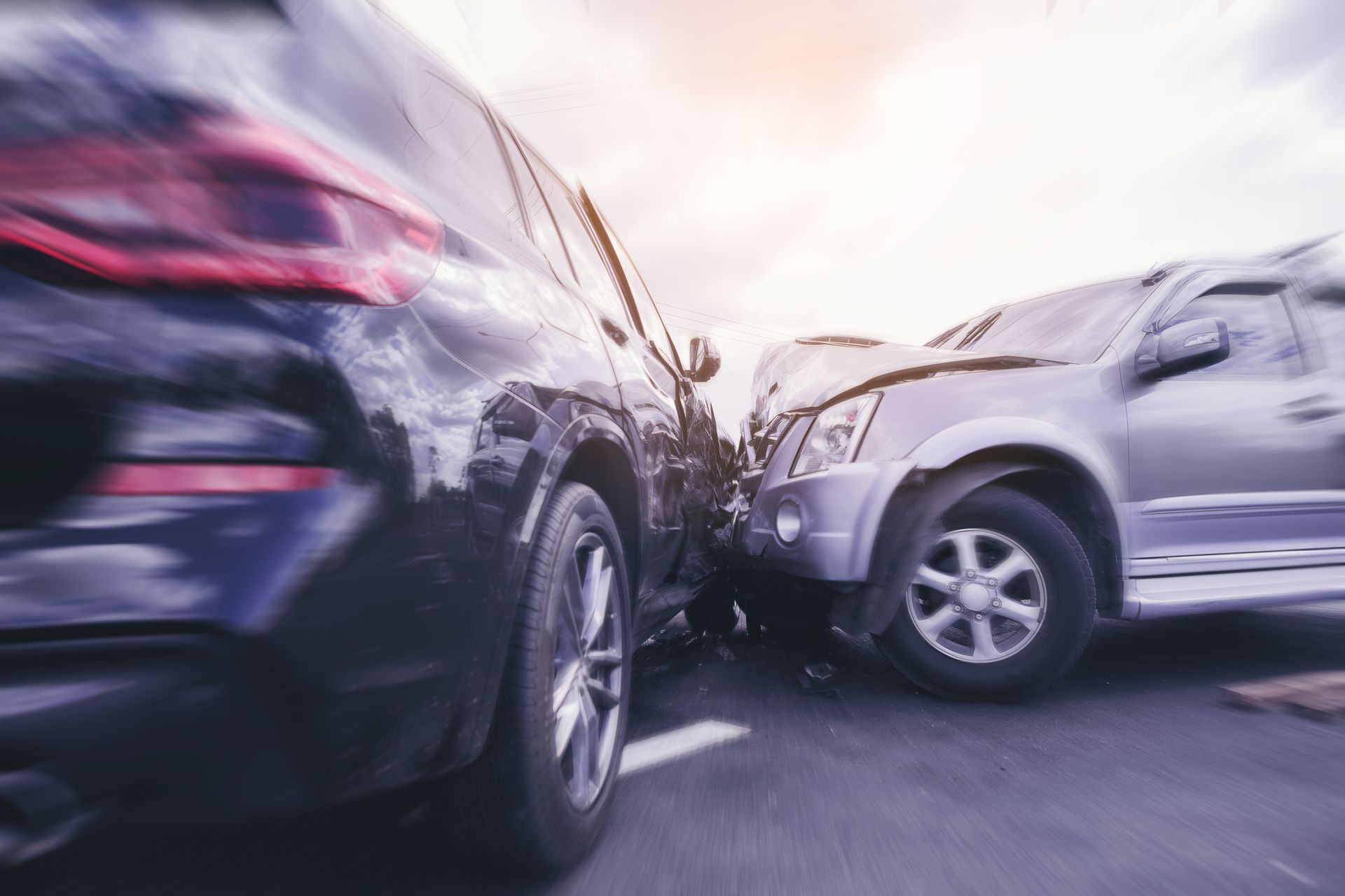 2 cars crashing into each other 